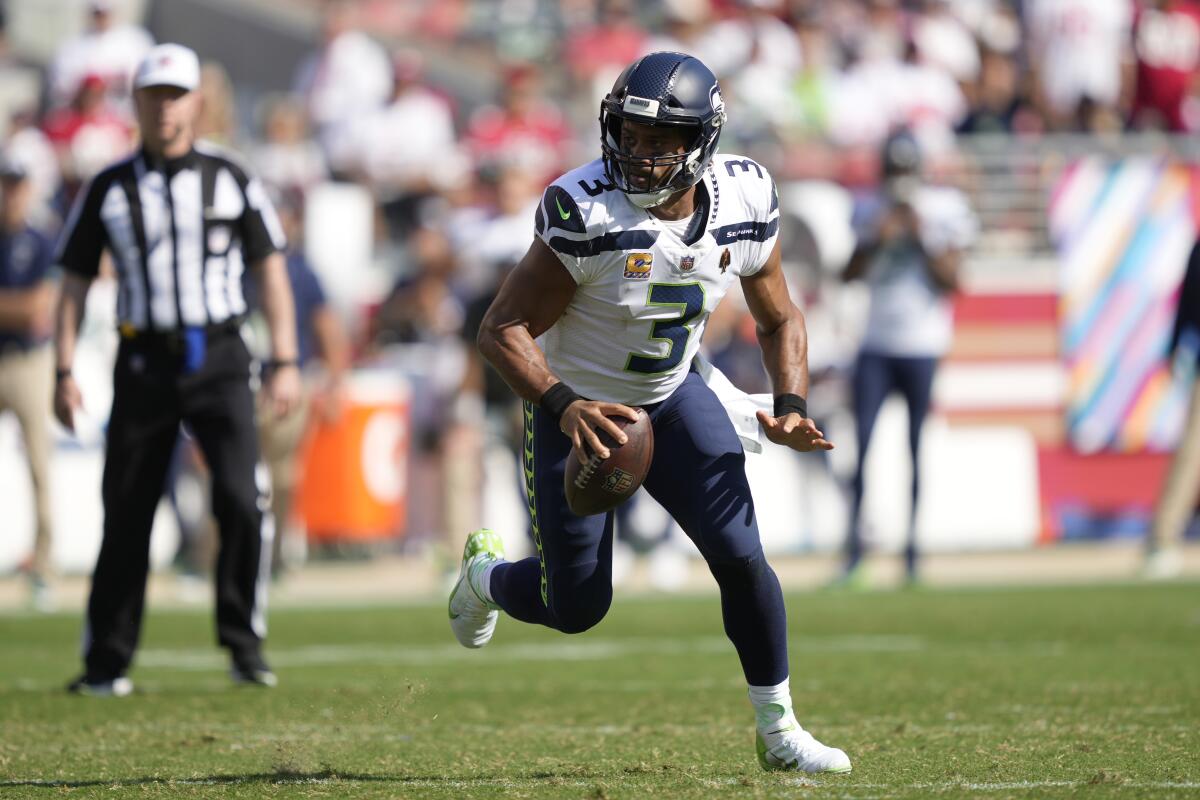 Seattle Seahawks quarterback Russell Wilson runs against the San Francisco 49ers on Oct. 3.