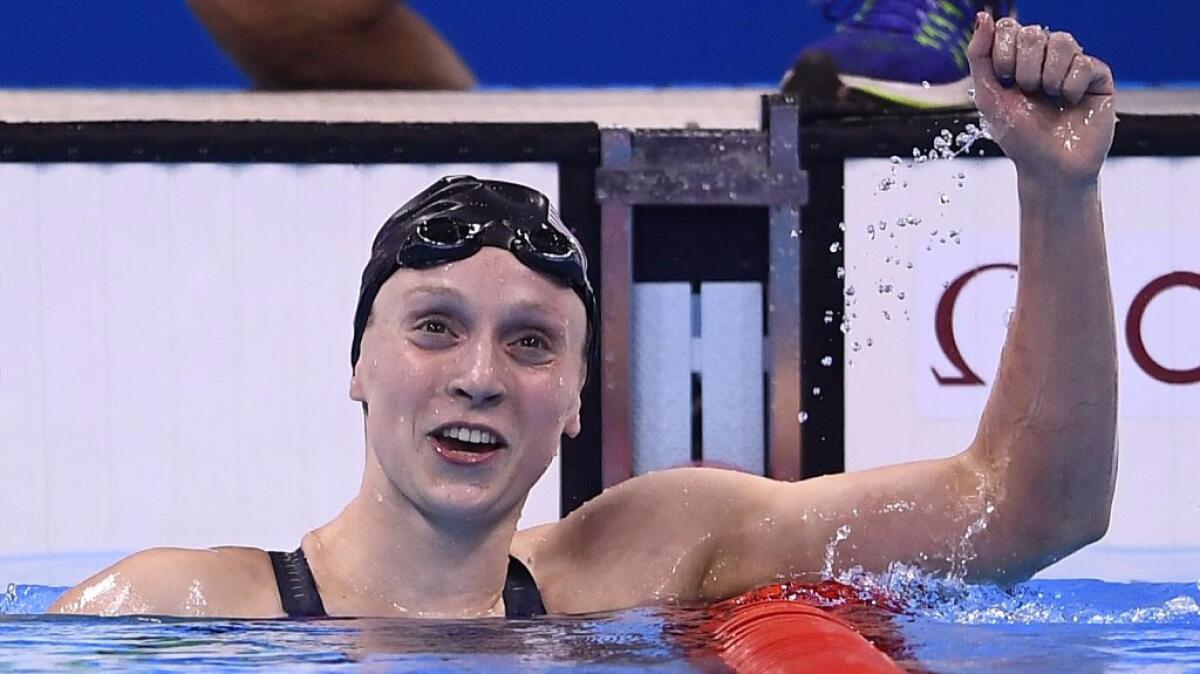 U.S. swimmer Katie Ledecky celebrates after breaking her world record in the 800-meter freestyle during the 2016 Summer Games on Aug. 12.