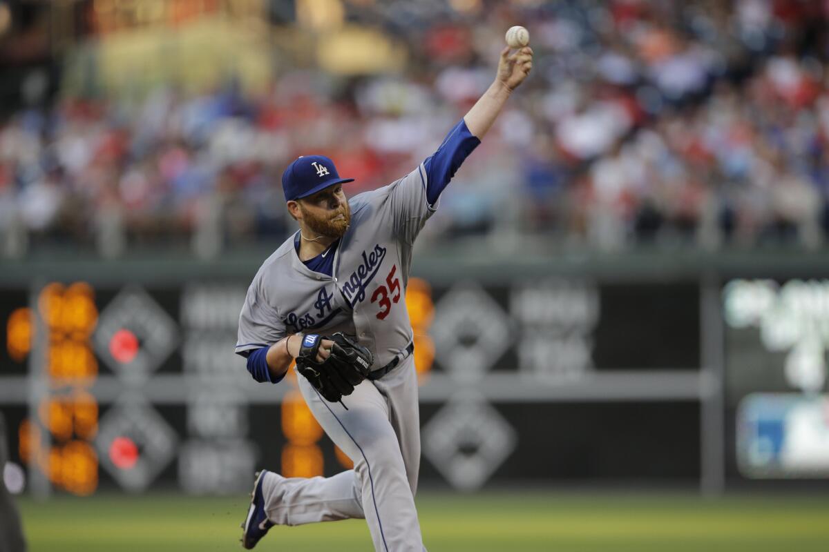Dodgers starting pitcher Brett Anderson delivers a pitch against the Phillies.