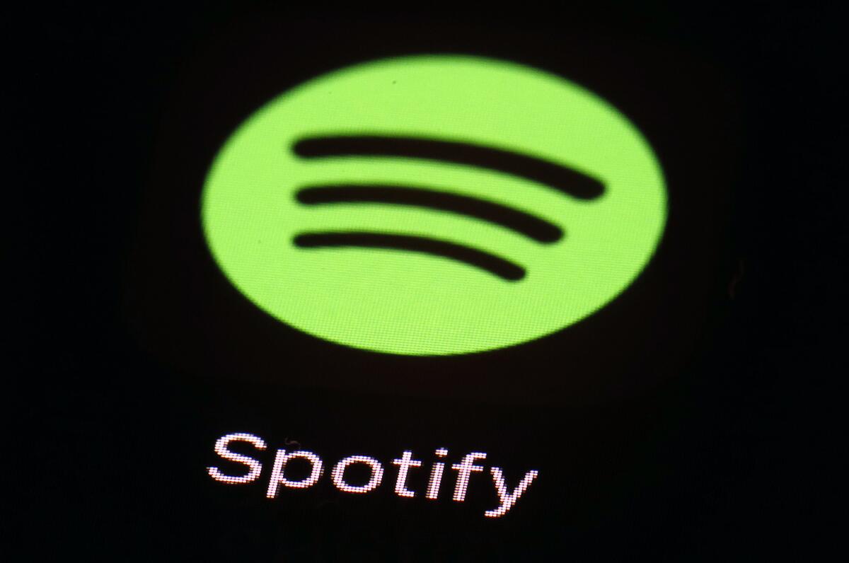 A 2018 file photo shows the Spotify app on an iPad in Baltimore. 