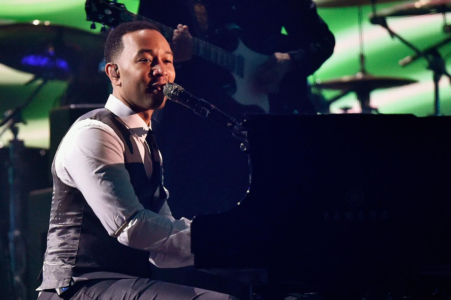 John Legend performs "East" for a tribute to MusiCares Person of the Year honoree Lionel Richie.