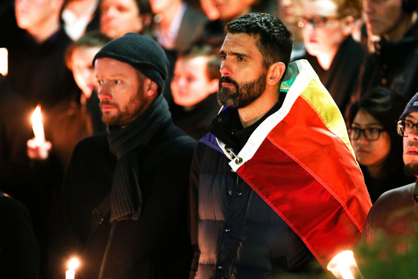 New Zealand residents gather in Frank Kitts Park to mourn victims of the Orlando nightclub shooting.