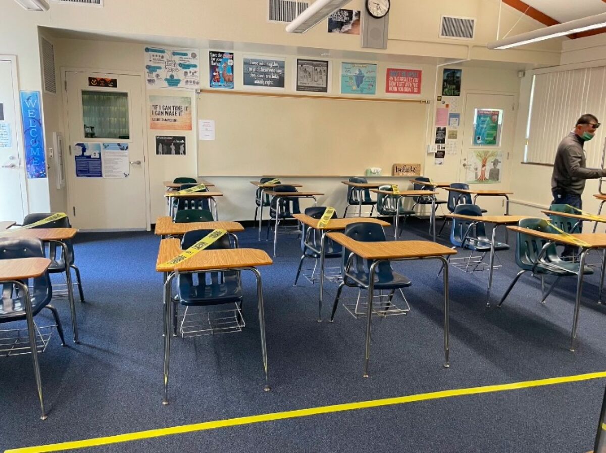 A classroom at La Costa Canyon has every other desk marked off.