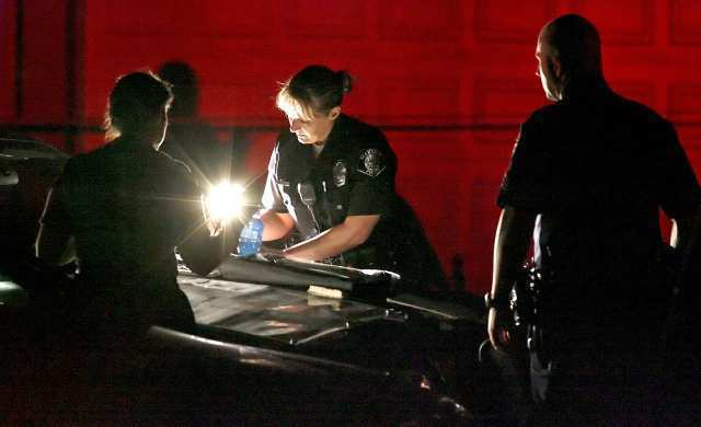 Glendale police work the scene of a single-engine plane crash north of Glenoaks Boulevard Monday night.
