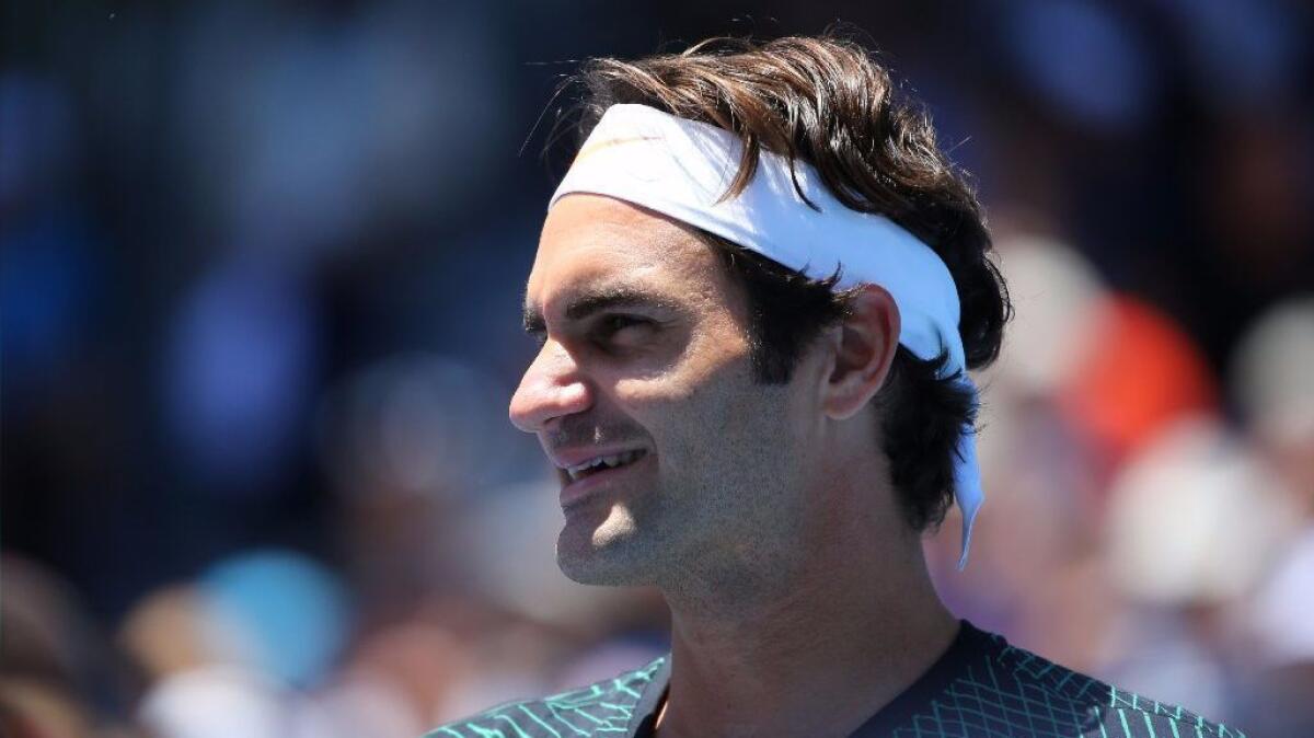 Roger Federer of Switzerland looks on during a practice session at the Australian Open on Jan. 25.