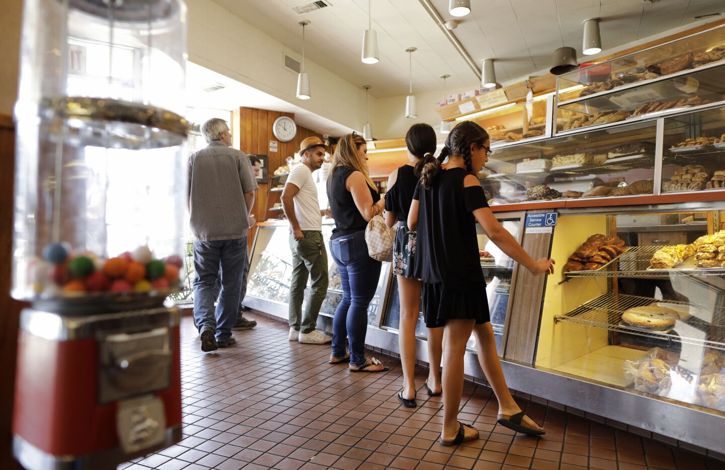 Customers line up for baked goods at Canter's.
