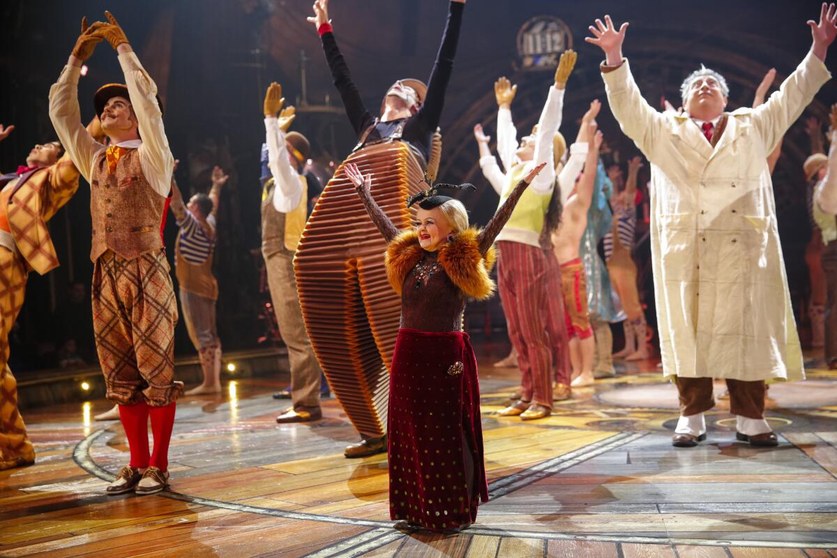 The cast of Cirque du Soleil's "Kurios" waves to the audience.