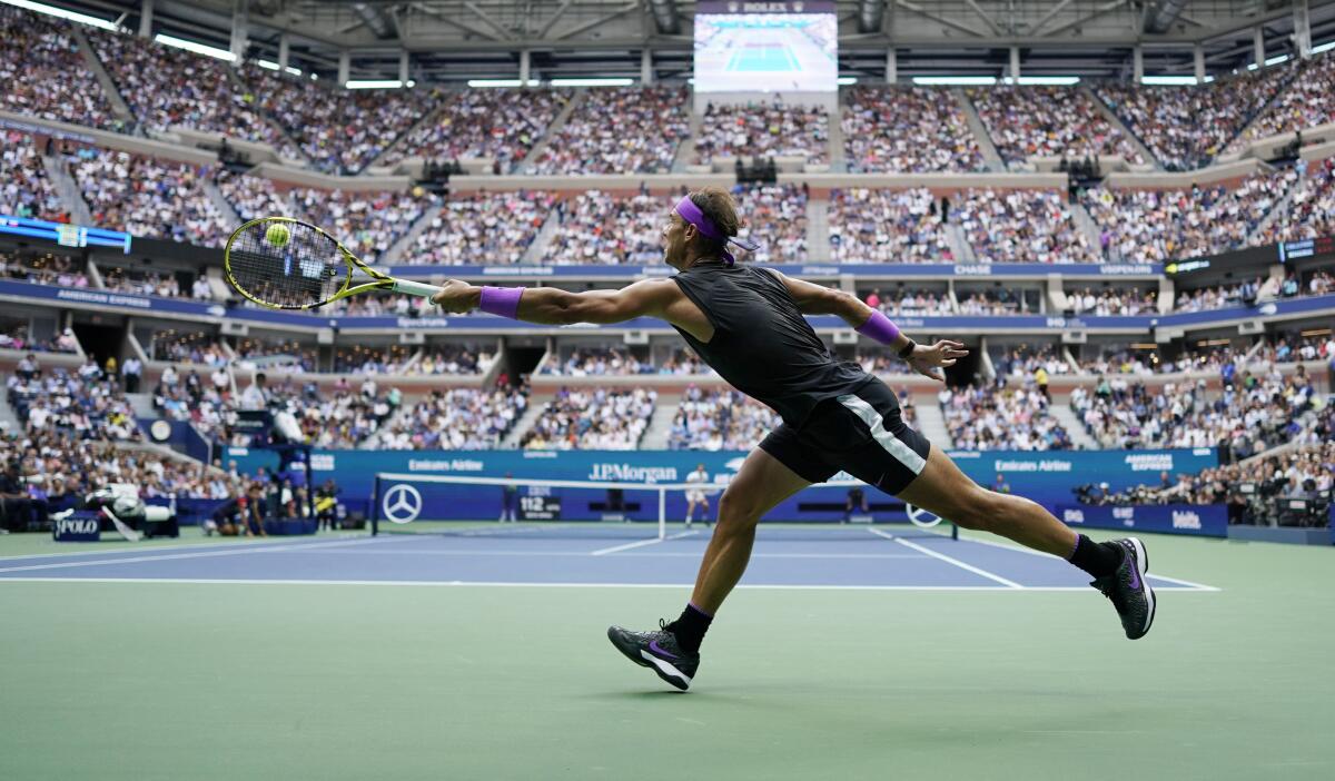 Rafael Nadal returns a shot to Daniil Medvedev during the men's singles final at the 2019 U.S. Open in New York. 