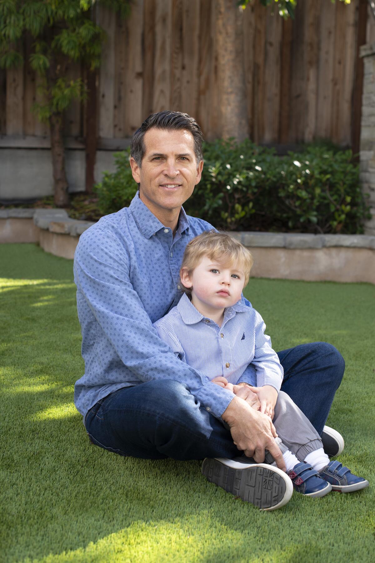 Dr. Justin West with his son, Andrew.