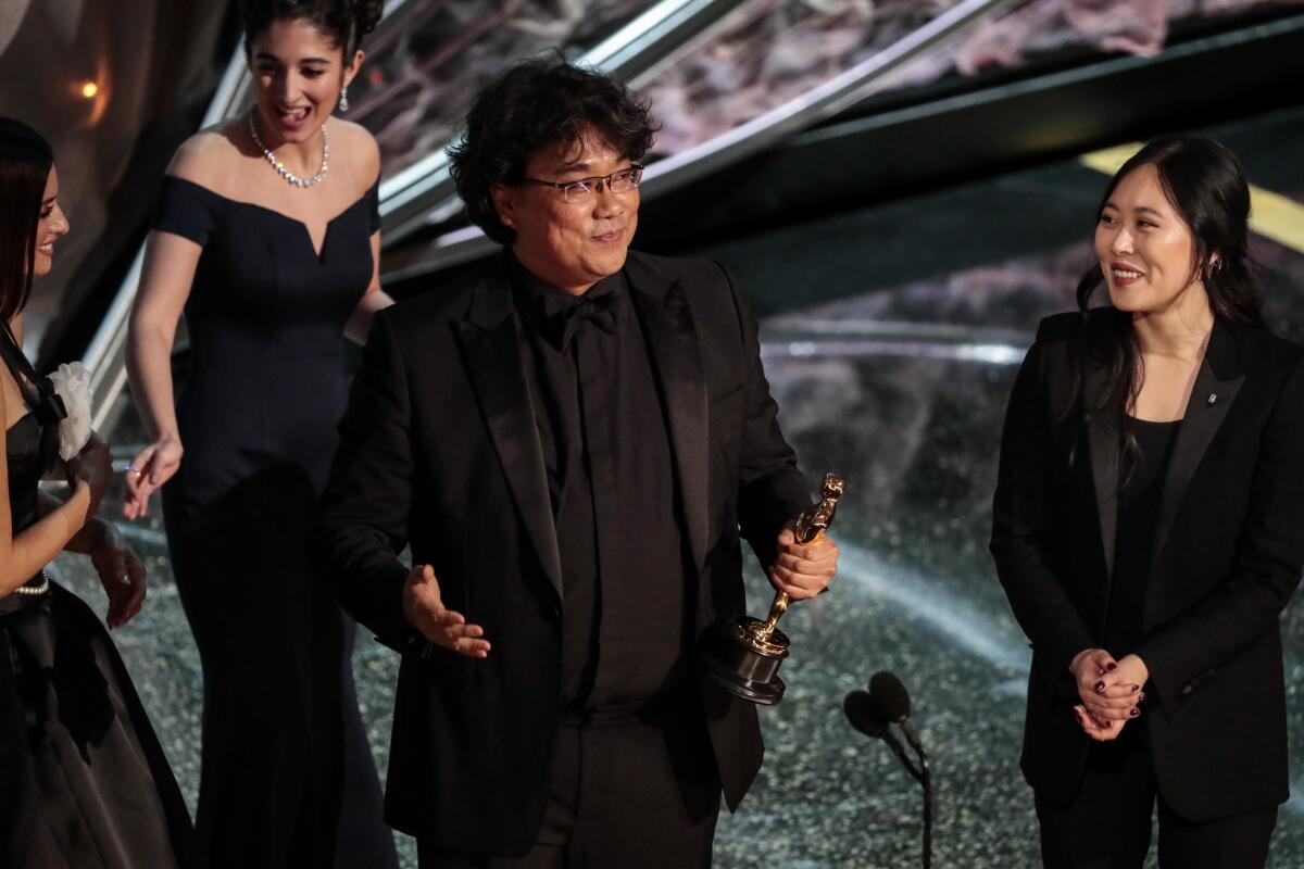 Bong Joon Ho accepts the international feature Oscar for “Parasite” during the telecast of the 92nd Academy Awards.