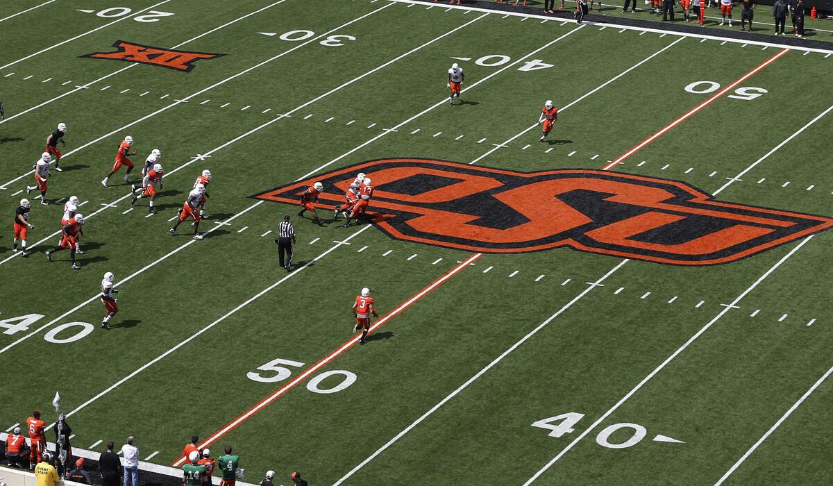 The Oklahoma State football team plays its spring football game on April 18. The program is on a year of probation for failing to follow its own drug-testing policies over a four-year span.