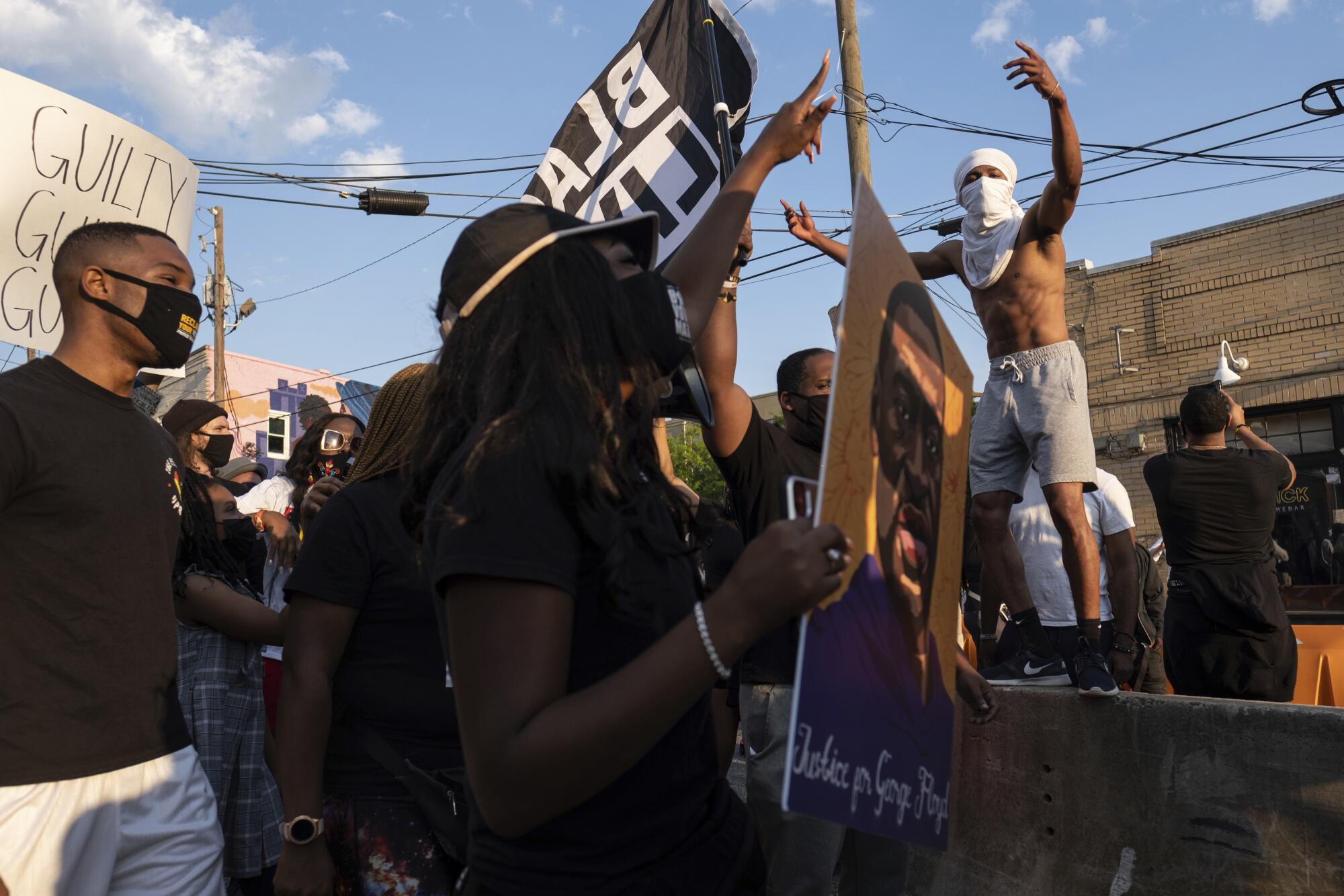 People gather in Atlanta to march through downtown after former Minneapolis police Officer Derek Chauvin was found guilty 