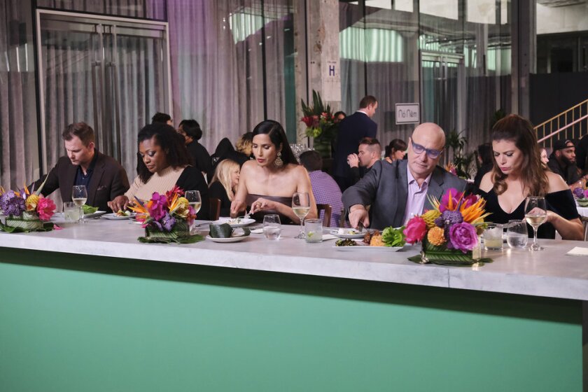 The "Top Chef" judges dine at a counter