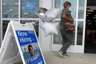 A shopper passes a hiring sign while entering a retail store in Morton Grove, Ill., Wednesday, July 21, 2021. Despite an uptick in COVID-19 cases and a shortage of available workers, the U.S. economy likely enjoyed a burst of job growth last month as it bounces back with surprising vigor from last year’s coronavirus shutdown. The Labor Department’s July jobs report Friday, Aug. 6 is expected to show that the United States added more than 860,000 jobs in July, topping June’s 850,000, according to a survey of economists by the data firm FactSet. (AP Photo/Nam Y. Huh)