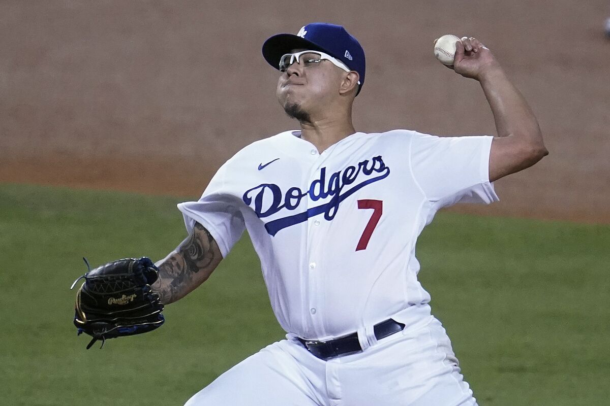 Dodgers reliever Julio Urías pitches to an Oakland Athletics batter. He retired 12 of the first 13 batters he faced.