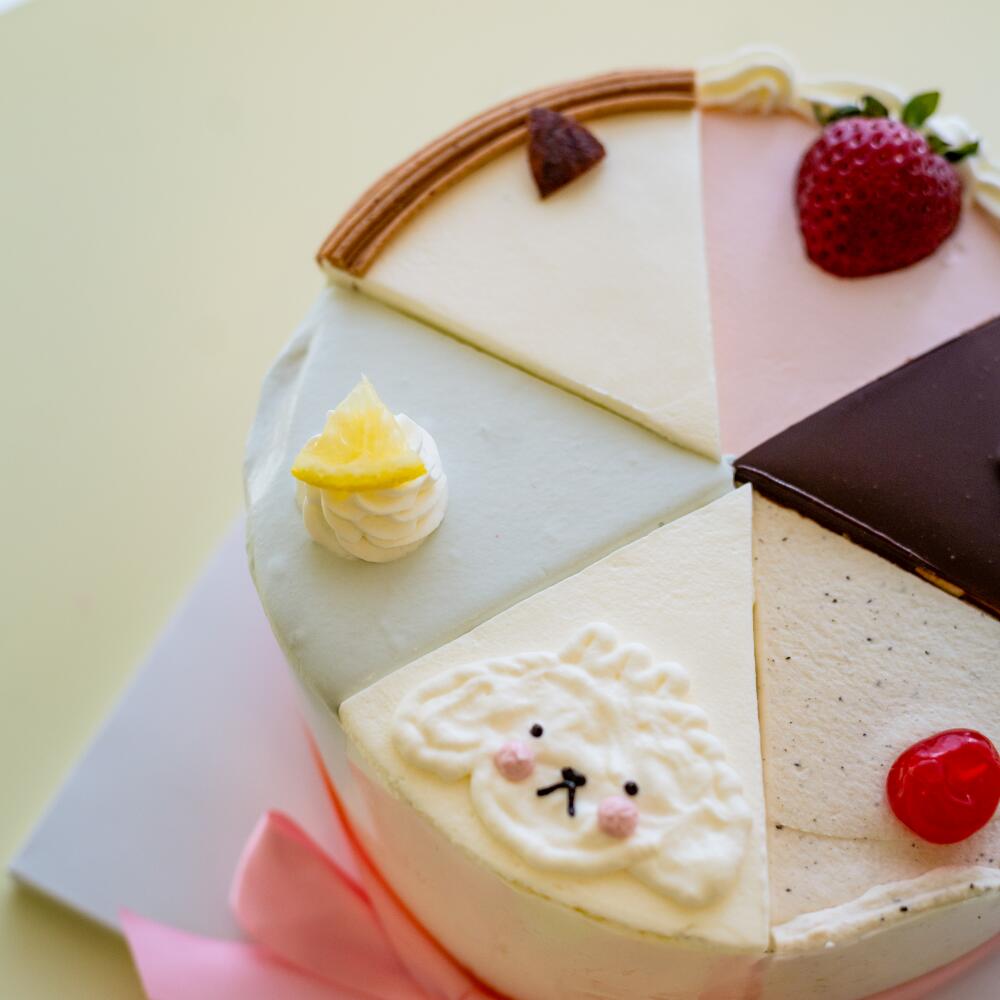 A round cake made up of six different wedge-shaped pieces at Harucake, a Koreatown bakery.