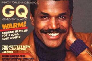 A GQ magazine cover featuring model Renauld White wearing a brown leather jacket and deep purple turtleneck sweater