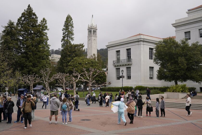 Students make their way through Sproul Plaza on the University of California, Berkeley, campus Tuesday, March 29, 2022, in Berkeley, Calif. (AP Photo/Eric Risberg)