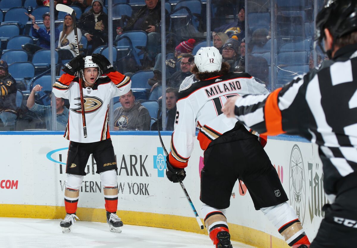 Trevor Zegras of the Ducks reacts to a goal by Sonny Milano on Tuesday in Buffalo.