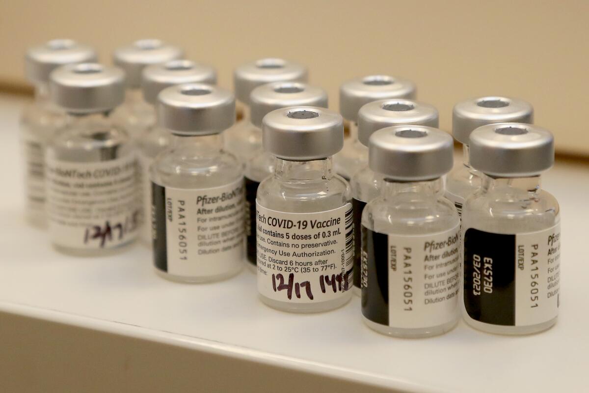 Empty vials of the Pfizer-BioNTech COVID-19 vaccine.