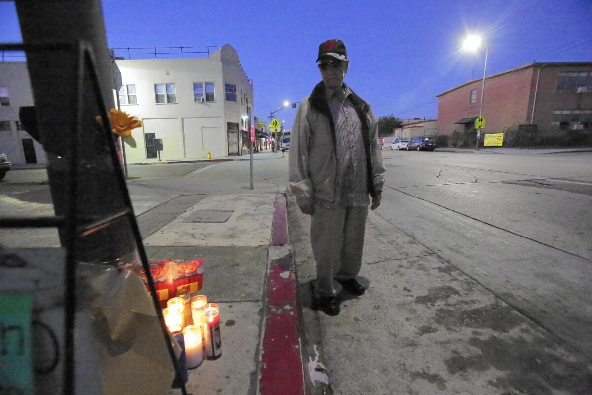 Salvador Jaramillo, 93, pauses at a memorial for his friend and walking partner, Jose Noriega. The 101-year-old was killed in a hit-and-run while crossing the intersection of Lorena and Opal streets in Boyle Heights.