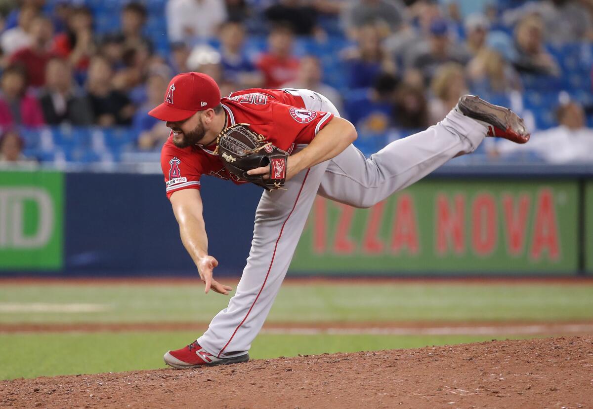 Angels reliever Cam Bedrosian delivers against the Toronto Blue Jays on June 19.