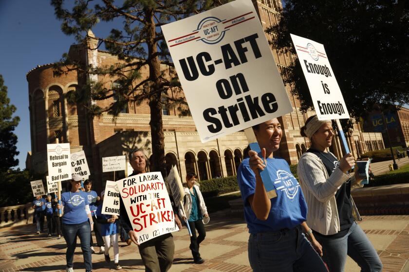 LOS ANGELES, CALIFORNIA-Jan. 25, 2023-UCLA lab school students, teachers, and supporters march through UCLA campus on Jan. 25, 2023. They are on strike because the university is not bargaining with them on their proposals (Carolyn Cole / Los Angeles Times)