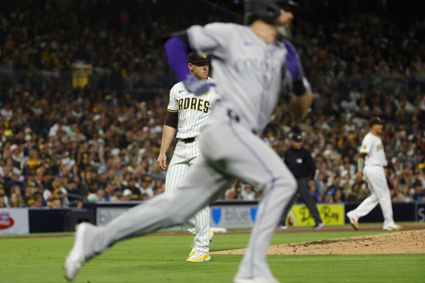 San Diego CA - May 14: San Diego Padres pitcher Stephen Kolek watches a RBI double by Colorado Rockies' Jake Cave in the sixth inning at Petco Park on Tuesday, May 14, 2024 in San Diego, CA. (K.C. Alfred / The San Diego Union-Tribune)