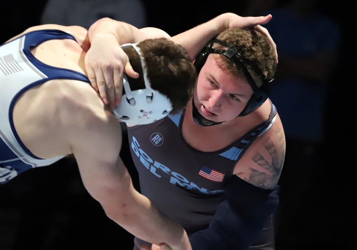 Newport Harbor's Asa Goff, left, and Corona del Mar's Tony Leon compete in the Battle of the Bay.