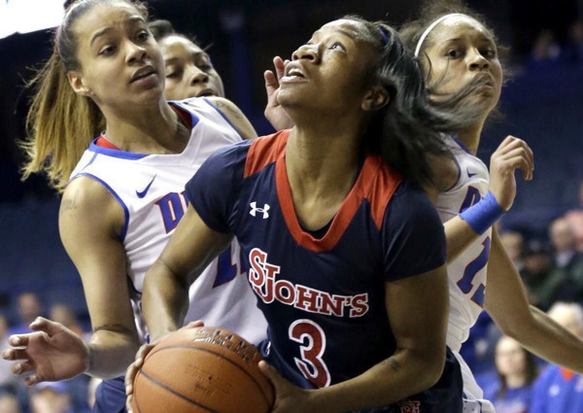 Guard Aliyyah Handford (3), who prepares to take a shot, leads St. John's in scoring a 16.2 points a game.