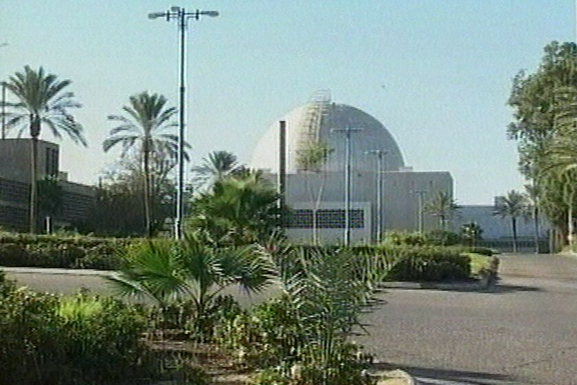 FILE - This file image made from a video aired Friday, Jan. 7, 2005, by Israeli television station Channel 10, shows what the television station claims is Israel's top secret nuclear facility in the southern Israeli town of Dimona, the first detailed video of the site ever shown to the public. The Israeli military said that a missile was fired into Israel from neighboring Syria early Thursday, April 22, 2021, and that it has struck targets in Syria in response. Earlier, air raid sirens sounded in Dimona, the Negev town that is home to Israel's secretive nuclear reactor, indicating a possible incoming attack. (Channel 10 via AP, File)