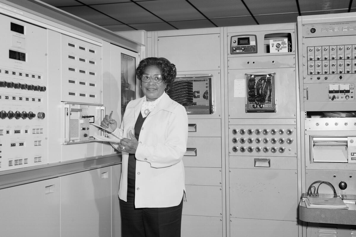 This 1977 photo made available by NASA shows engineer Mary W. Jackson at NASA's Langley Research Center in Hampton, Va. 