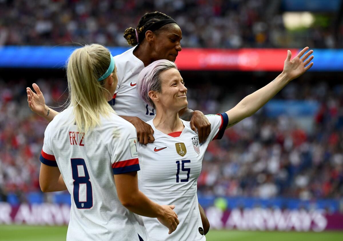 Megan Rapinoe (15) of the U.S. celebrates after scoring the first goal of the match in the fifth minute of the Women's World Cup quarterfinal against France on June 28 in Paris.