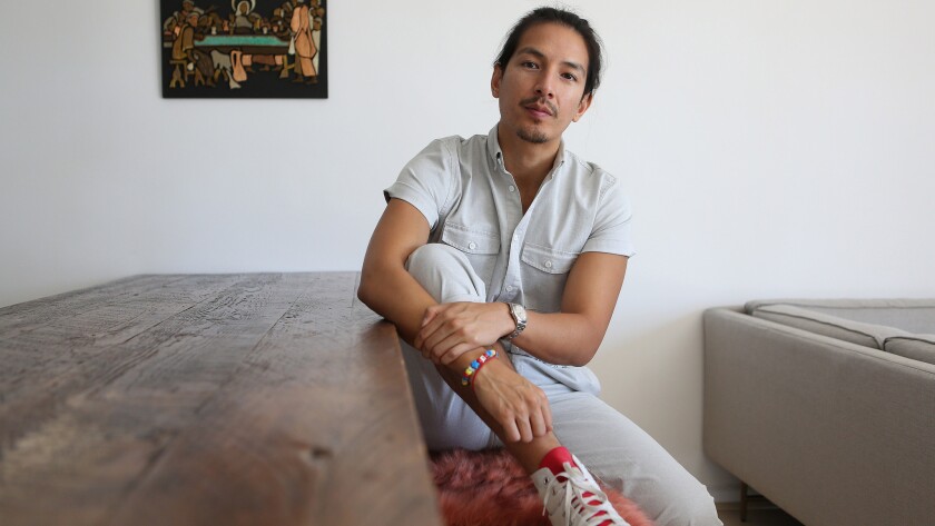 Christopher Louie, director of the new Netflix feature film "XOXO," which he describes as “‘Dazed and Confused’ at a rave,” at his home in Glendale.