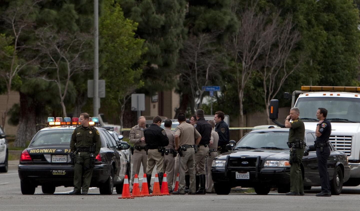 Orange County sheriff's deputies and CHP officers investigate the scene East Katella Avenue and North Wanda Road in Orange.