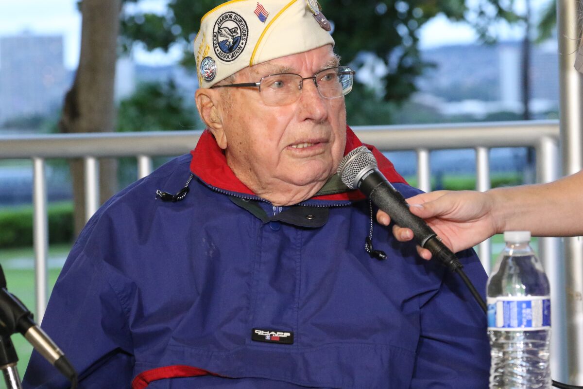 Pearl Harbor survivor Herb Elfring speaks at a news conference in Pearl Harbor, Hawaii on Sunday, Dec. 5, 2021. A few dozen survivors of Pearl Harbor are expected to gather Tuesday, Dec. 7 at the site of the Japanese bombing 80 years ago to remember those killed in the attack that launched the U.S. into World War II. (AP Photo/Audrey McAvoy)
