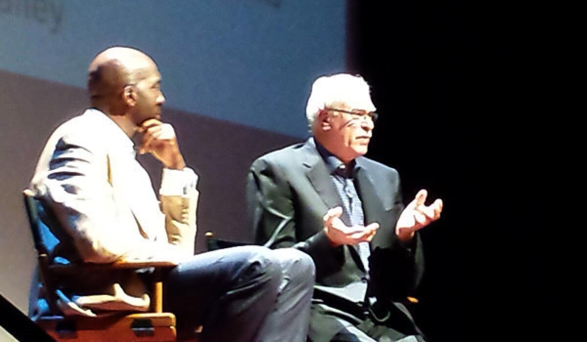 Former Lakers Coach Phil Jackson, right, told an audience at "Live Talks Los Angeles" that sometimes he feels he can get back on the court and lead a team, but "the reality is I'm kidding myself."
