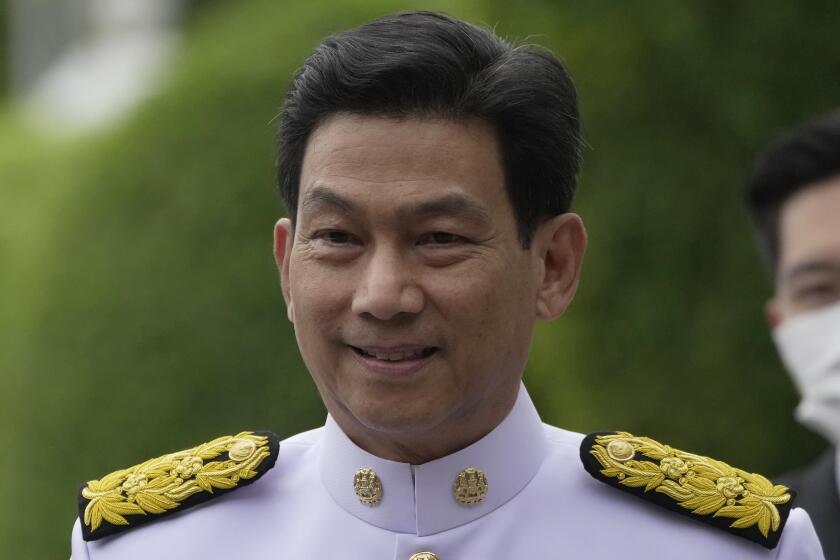 FILE - Thailand's Foreign Minister Parnpree Bahiddha-Nukara arrives at the government house in Bangkok, Thailand, Tuesday, Sept. 5, 2023. Thailand’s Foreign Minister Parnpree Bahiddha-Nugara, who is also a deputy prime minister, abruptly resigned Monday, April 29, 2024, after the cabinet reshuffle removed him from the latter position. (AP Photo/Sakchai Lalit, File)