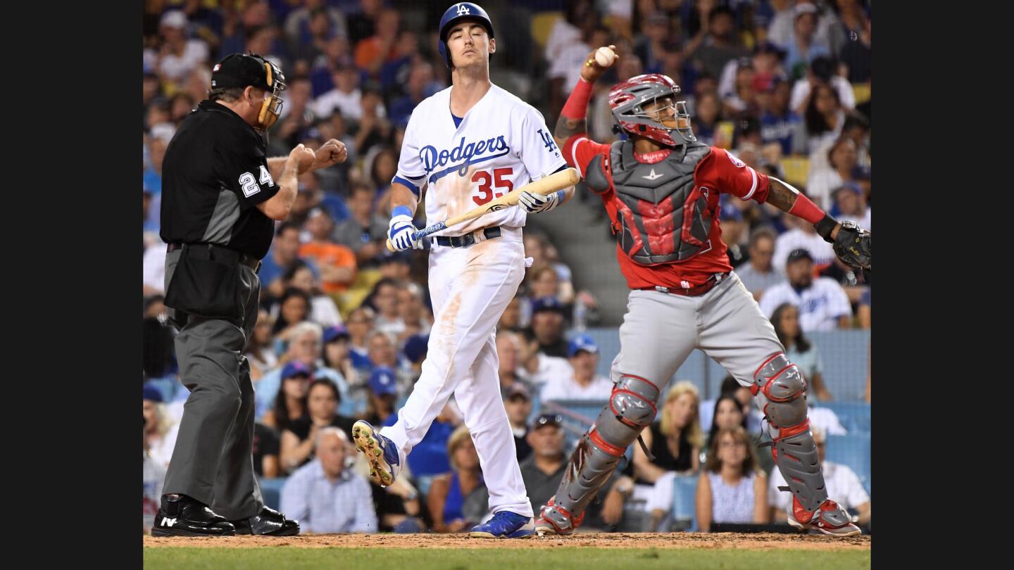 Dodgers Cody Bellinger strikes out against the Angels in the 6th inning.