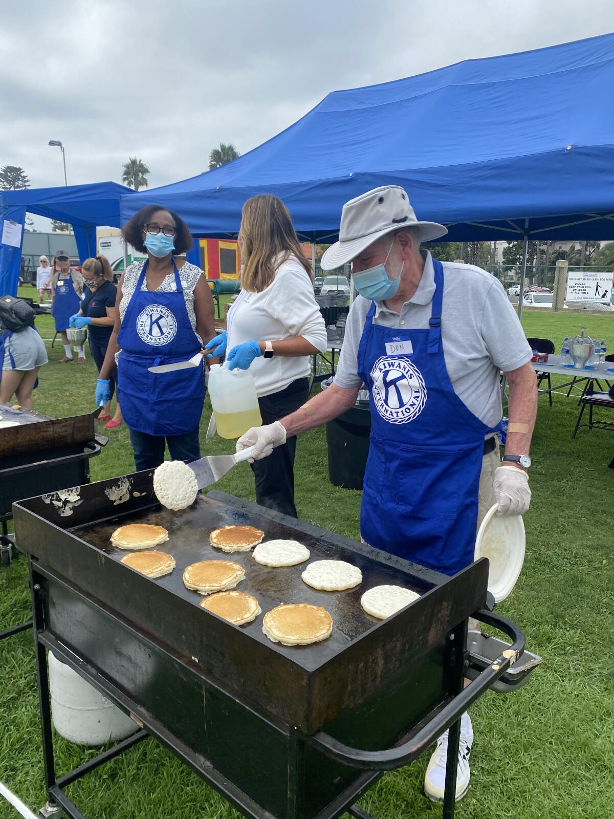 Kiwanis Club of La Jolla member Don Hodges staffs the griddle during the club's pancake breakfast in 2021.