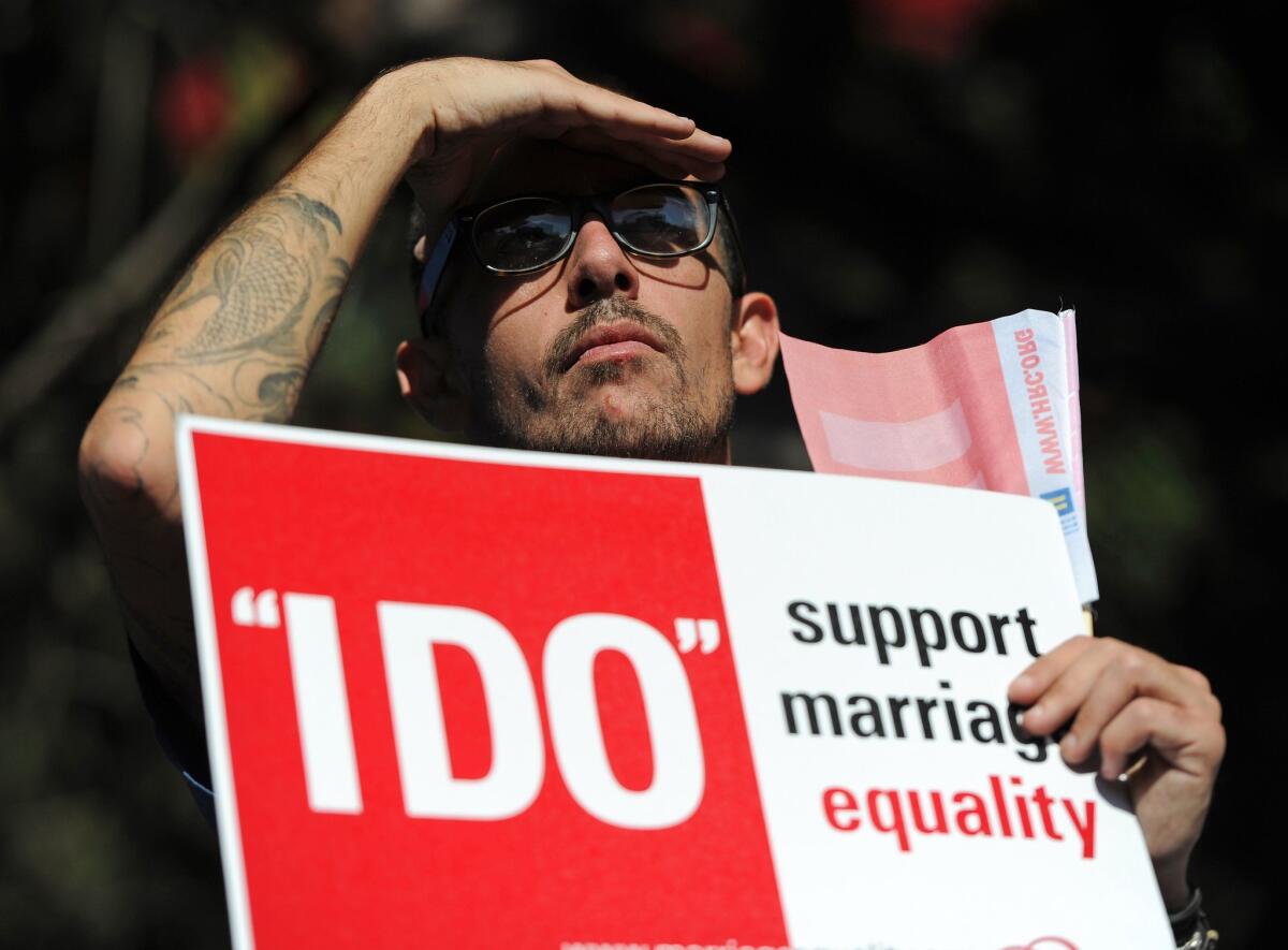A same-sex marriage supporter attends a rally in West Hollywood.