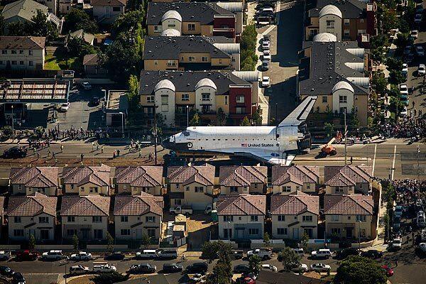 The space shuttle Endeavour squeezed through L.A. on its way to its final home at the California Science Center.