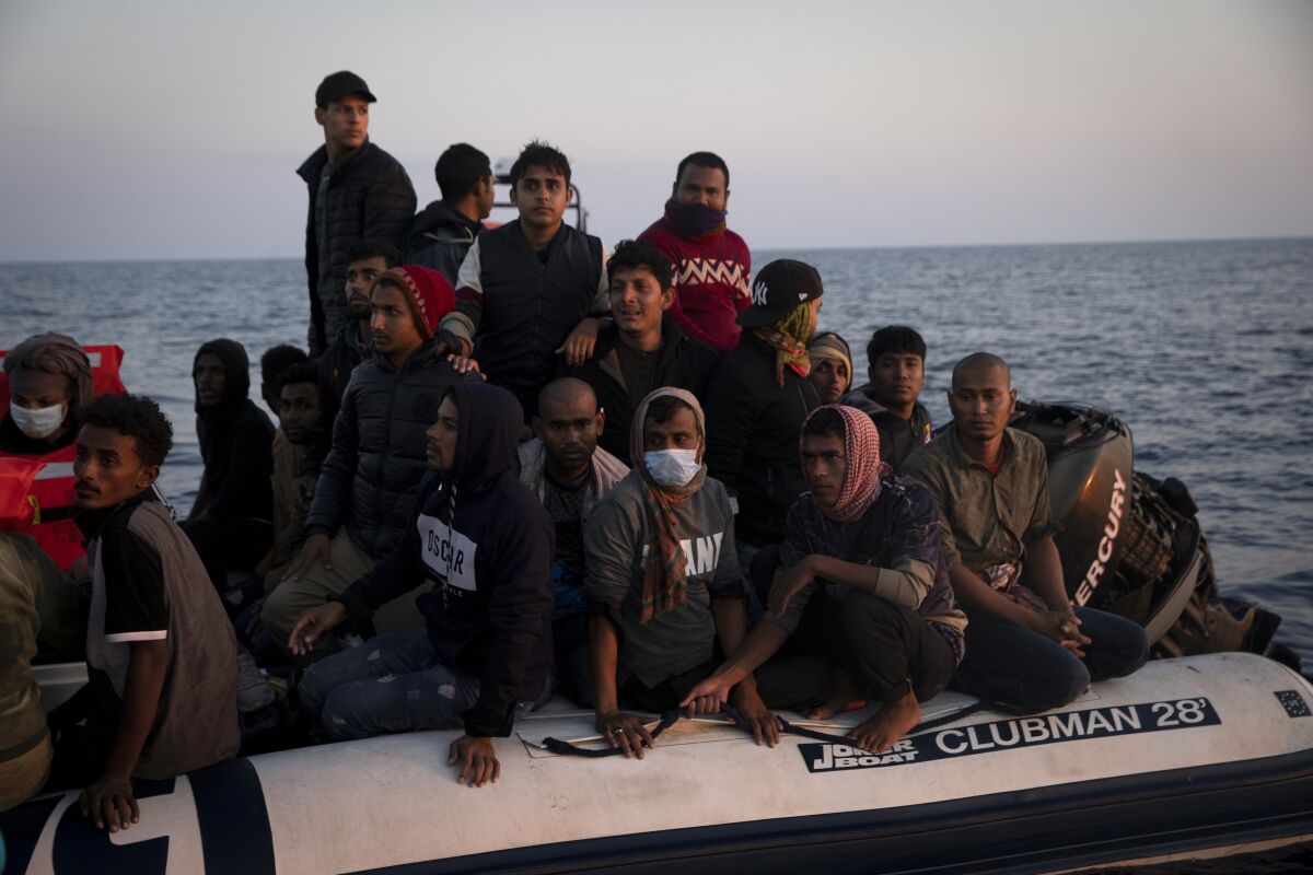 Bangladeshi migrants making their way from Libya to Europe are rescued by the crew of the Geo Barents