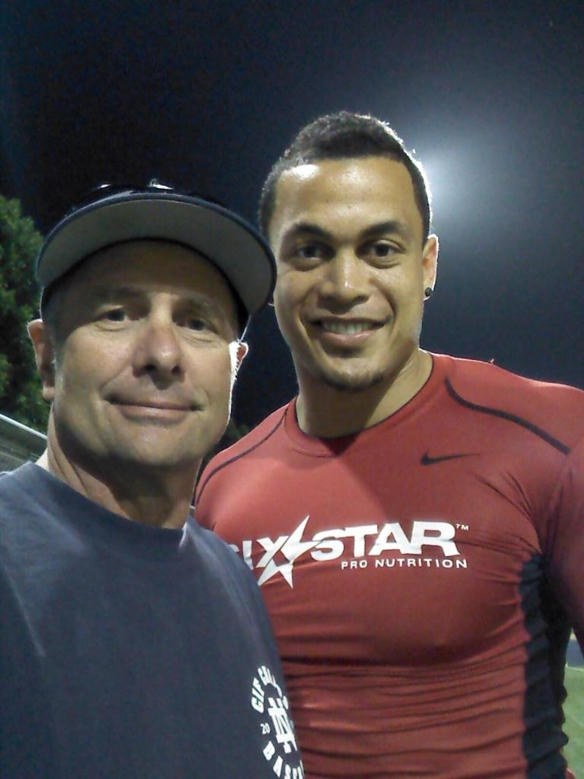 Sherman Oaks Notre Dame baseball coach Tom Dill with his former pupil, Giancarlo Stanton.