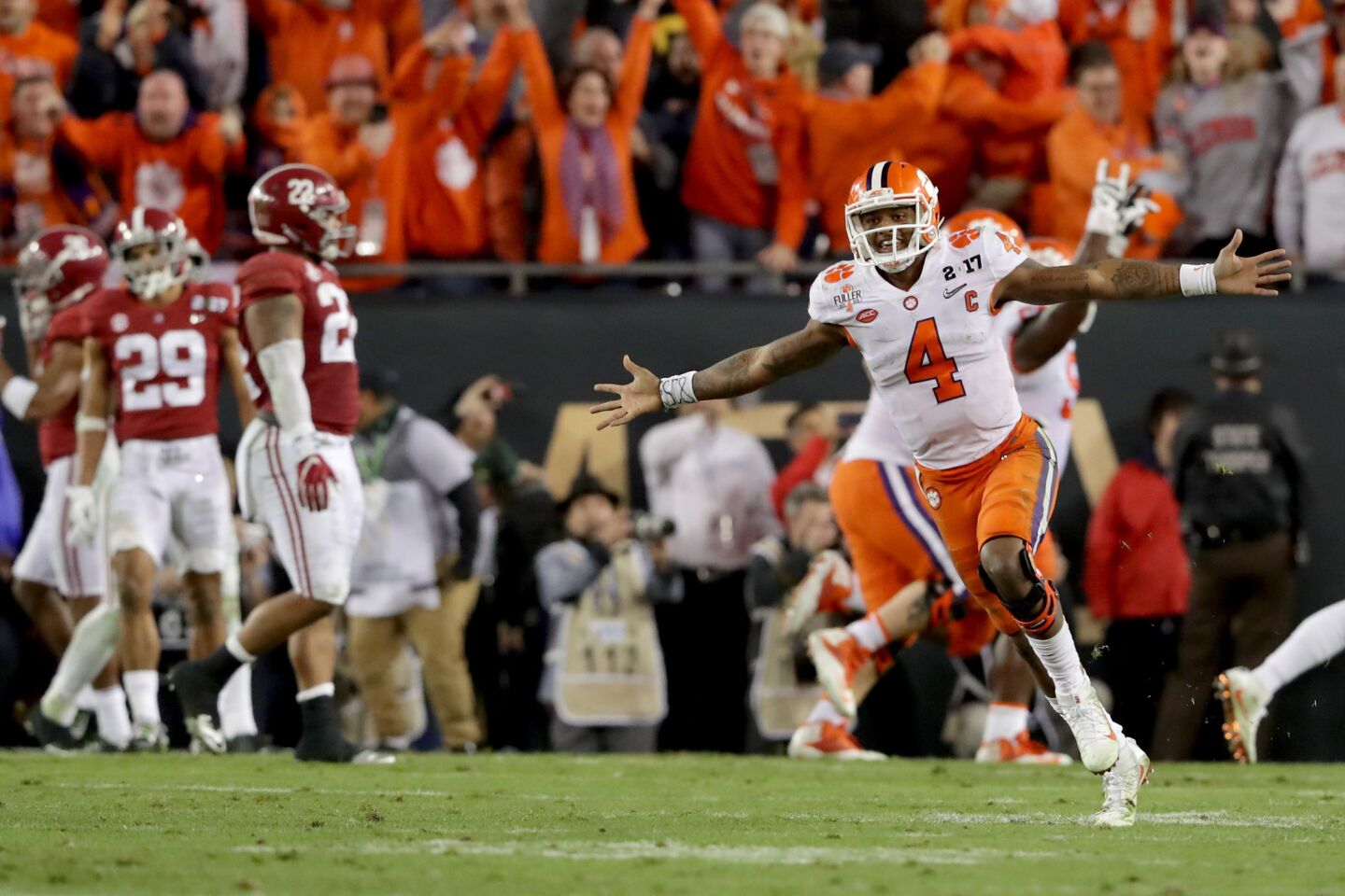Clemson quarterback Deshaun Watson celebrates after throwing a two-yard pass to Hunter Renfrow for the winning touchdown in the College Football Playoff title game.