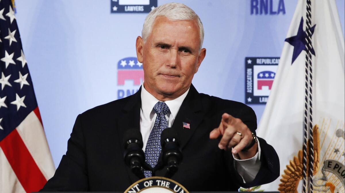 Vice President Mike Pence gestures while speaking to the Republican National Lawyers Assn. on Friday.