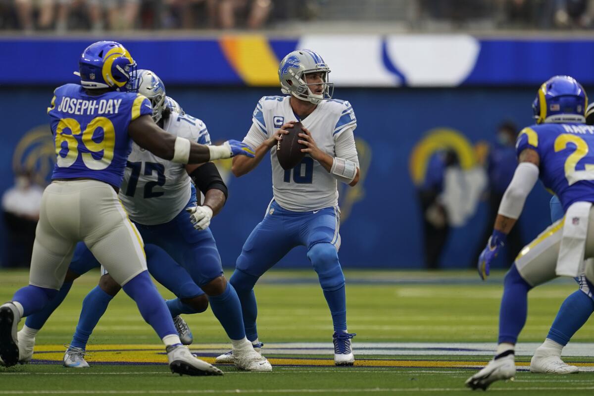 Detroit Lions quarterback Jared Goff looks to pass during the first half.