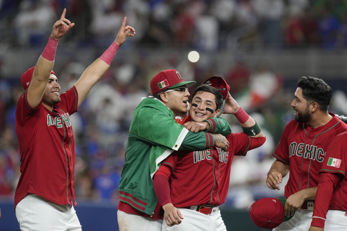 Mexico players celebrate aft 