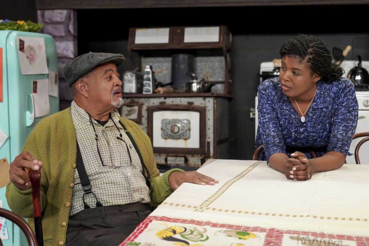Antonio TJ Johnson, left, and Joy Yvonne Jones in a scene from New Village Arts' "The Ferryman."