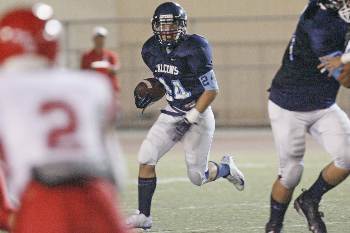 CV's Kyle Tavizon runs with the ball during a game against Burroughs at Glendale High School on Thursday, October 4, 2012.